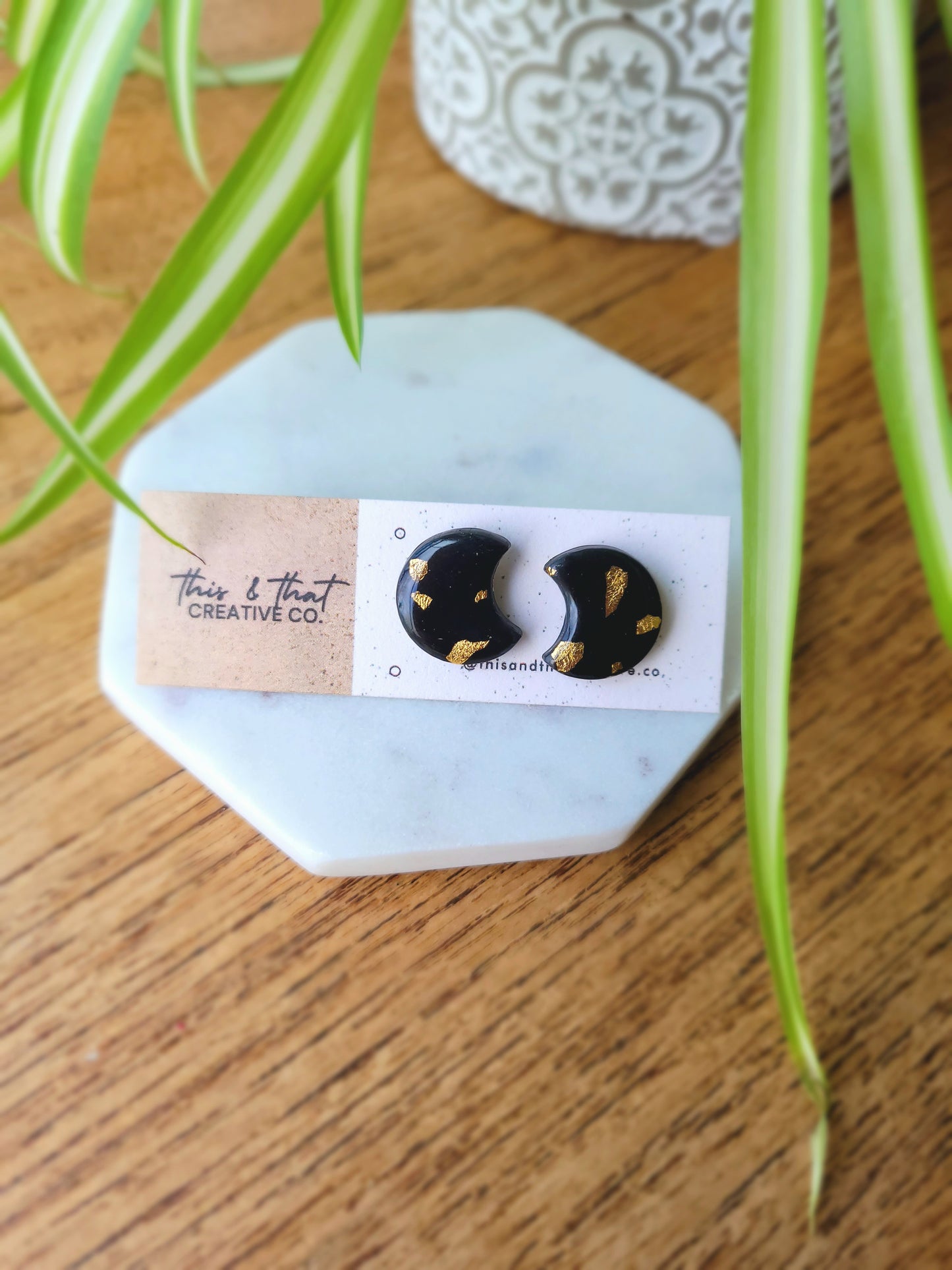 Black and gold studs